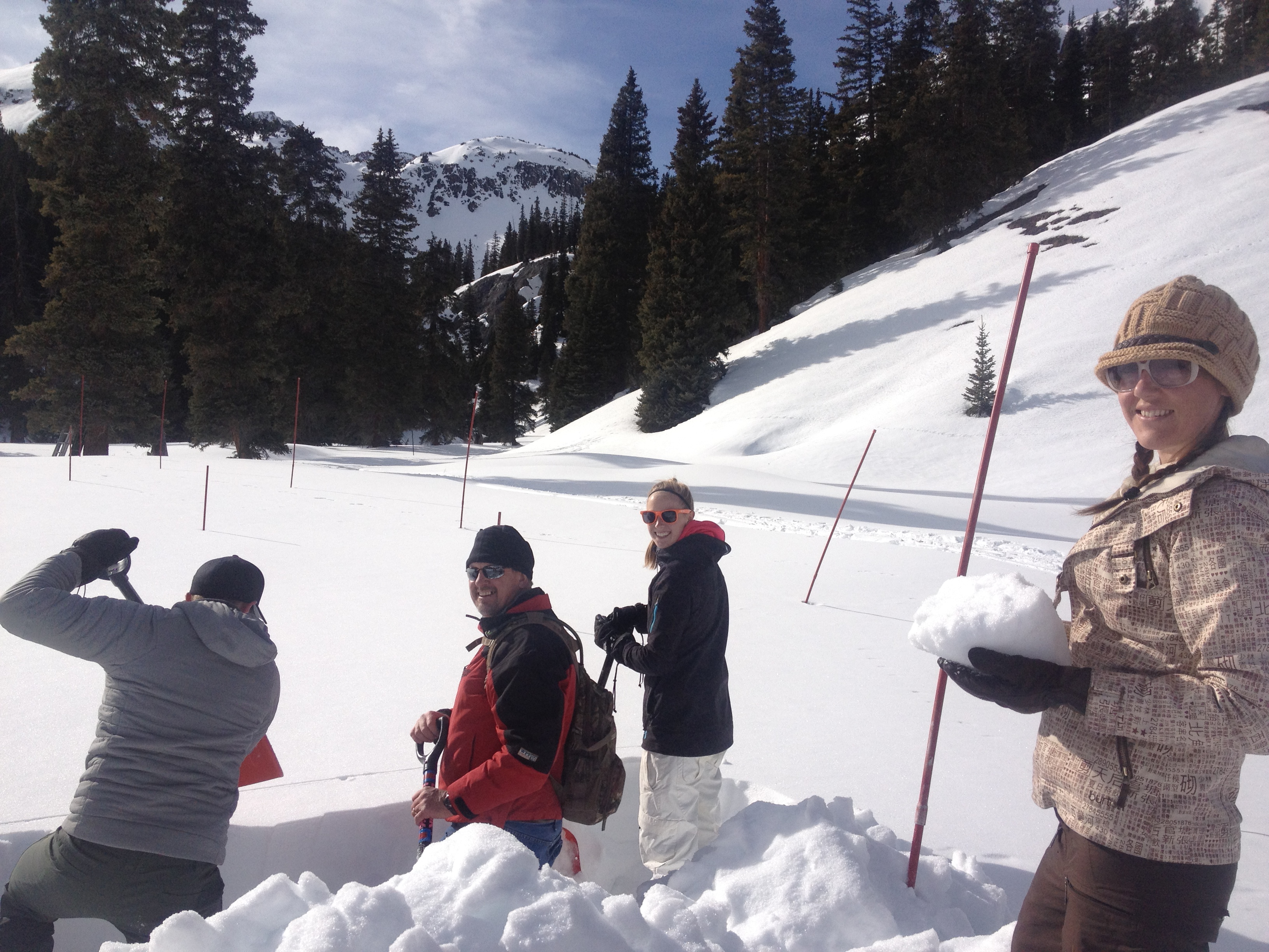 2015 Snow School participants, from left to right, Nathan Elder (back turned) from Denver Water, Rob Phillips from Rio Grande Water Conservation District, Brenna Mefford from Wyoming State Engineer’s Office, and Marta Nelson, from Radiometrics Corp.